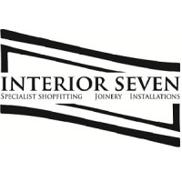 Expert Shopfitting Services by Interior Seven: Transforming Retail and Commercial Spaces Interior Seven team installing custom joinery in a retail store, showcasing their expert shop fitting services.